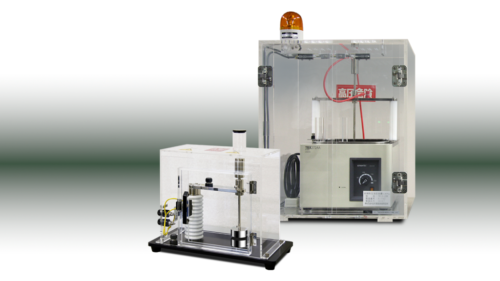 油中/気中電極治具装置